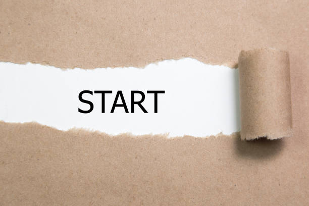 istock The word start written on torn paper 910721854
