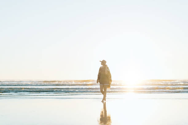 istock Boho style woman having fun on the beach 910722376
