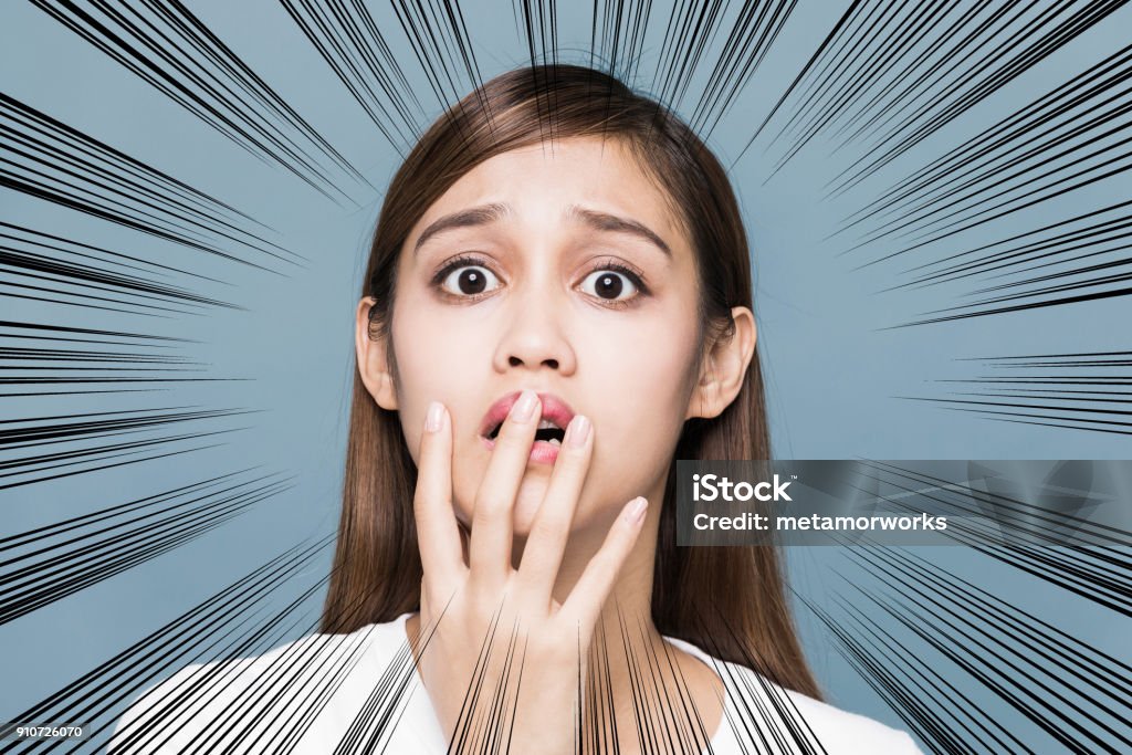 Surprised young woman. Shock Stock Photo