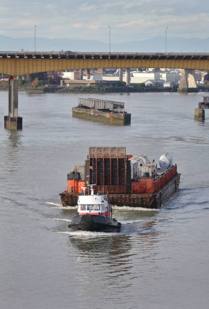 istock Tug Boat and Barge, Fraser River vertical 910728638