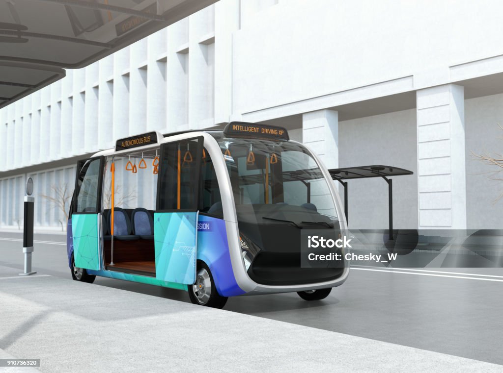 Self-driving shuttle bus waiting at bus station Self-driving shuttle bus waiting at bus station. The bus station equipped with solar panels for electric power. 3D rendering image. Bus Stock Photo
