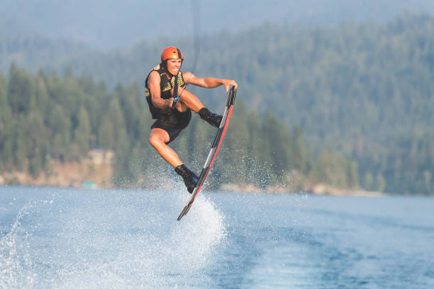 istock Male wakeboarder on lake 910736584