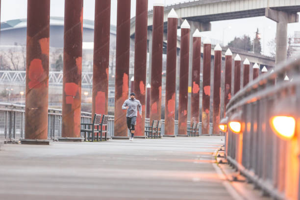 istock Fit Ethnic Male Exercising in Urban Environment 910742614