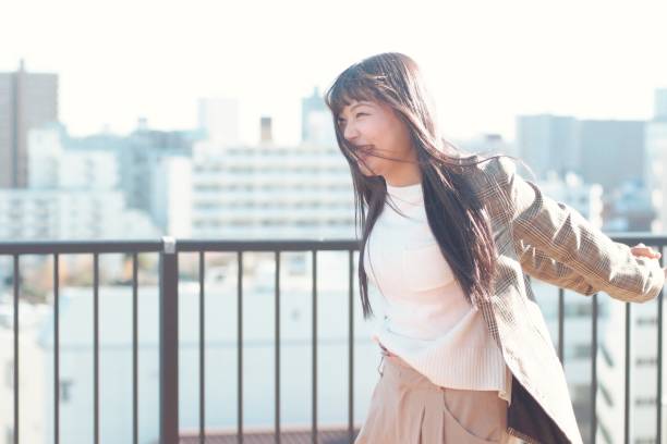 Young woman outside on sunny winter day