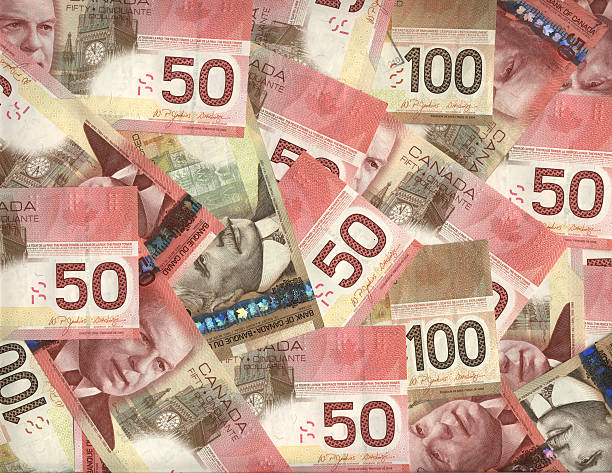 Sfondo di Canadian cinquanta e banconote da cento dollari - foto stock