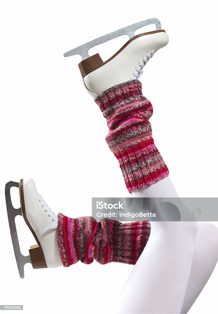 Legs with pink leg-warmers and skates kicking up into air More images: Adult Stock Photo