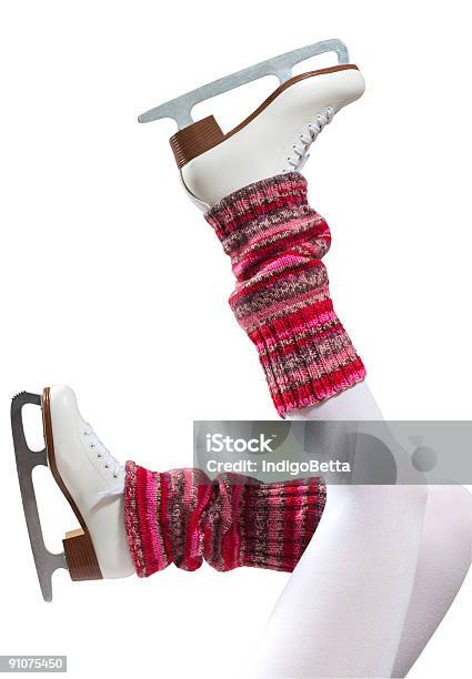 Legs With Pink Legwarmers And Skates Kicking Up Into Air Stock Photo - Download Image Now