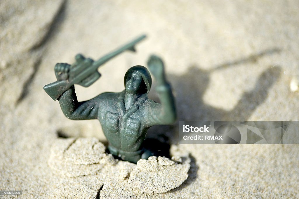 Żołnierzyk na piasek - Zbiór zdjęć royalty-free (Poddawać się)
