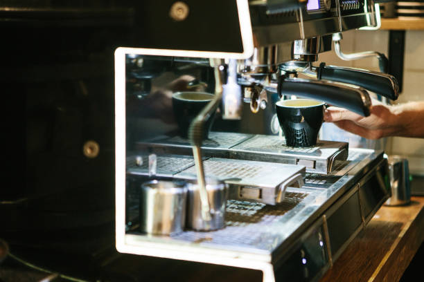 istock Coffee machine with steam in the process. A cafe 910758720