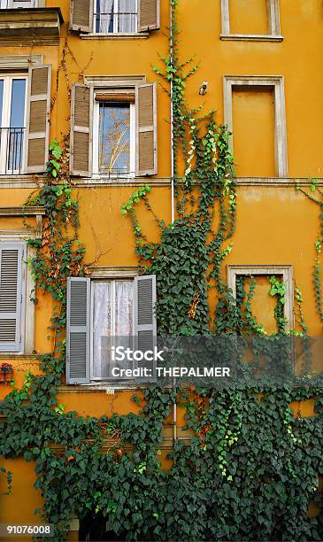 Roman Yellow Facade Stock Photo - Download Image Now - Color Image, Covering, Creeper Plant