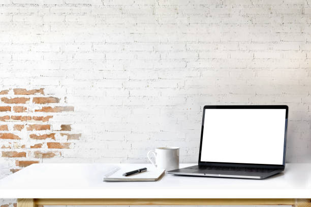 Mockup laptop on white wood.