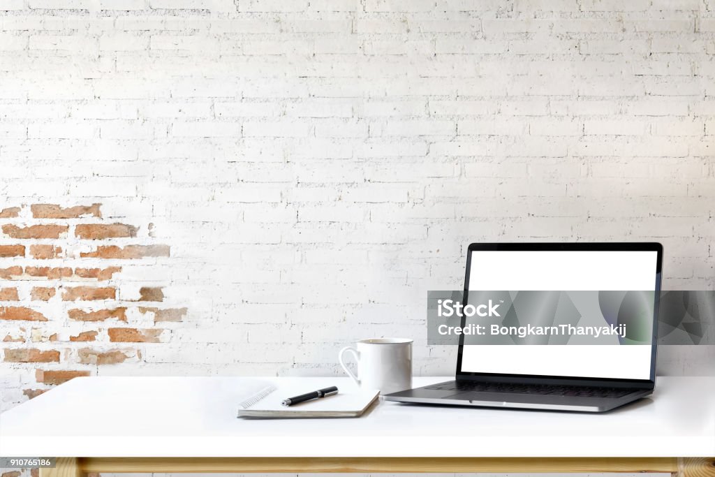 Mockup laptop on white wood. Laptop Stock Photo