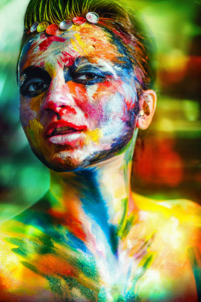 istock beautiful young woman creative make up 910779672