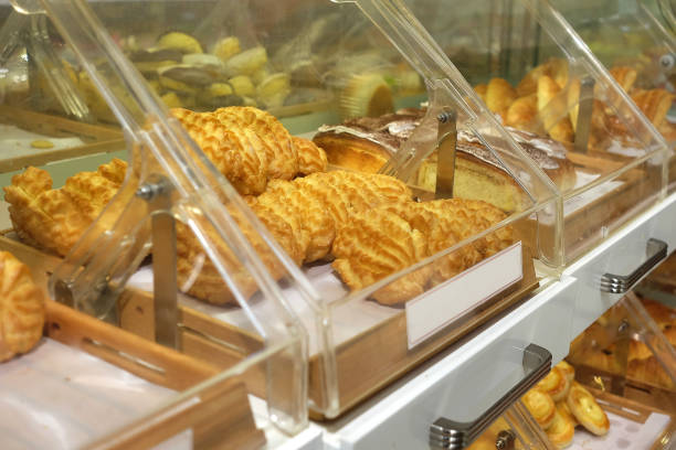 istock Bread fresh Baked loaves at bakery shop 910782236