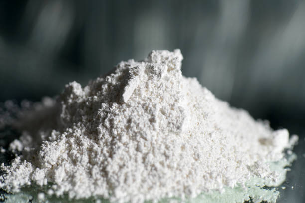 Calcium hydroxide Calcium hydroxide as a powder hydroxide stock pictures, royalty-free photos & images
