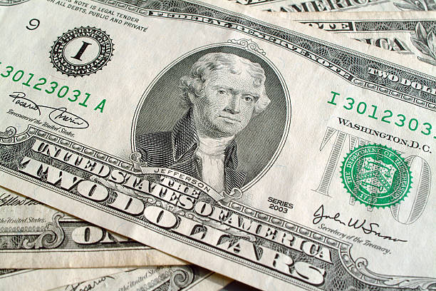 istock American 1 and 2 dollar bills 91078546
