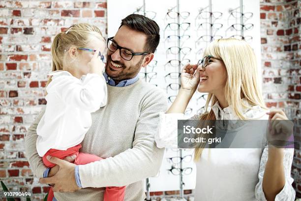 Family In Optics Store Stock Photo - Download Image Now - Eyeglasses, Family, People