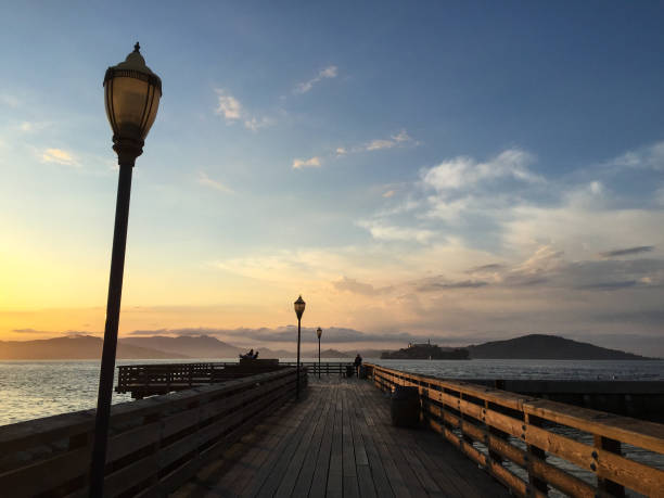 istock Sunset at wooden pier 910794010