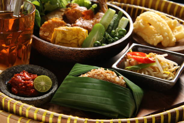 istock Nasi Tutug Oncom with Side Dishes and Condiment 910794158