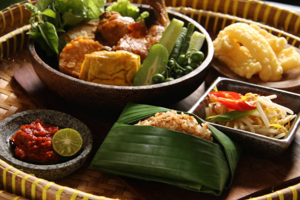 istock Nasi Tutug Oncom with Side Dishes and Condiment 910794160