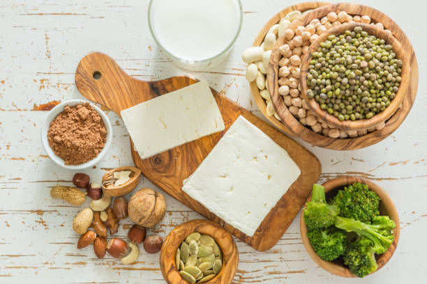 istock Selection vegan protein sources on wood background 910797294