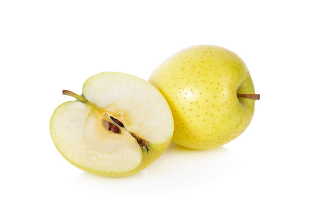 whole and half cut fresh Toki apples with stem on white background