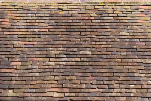 Old vintage concrete roof tiles full frame.