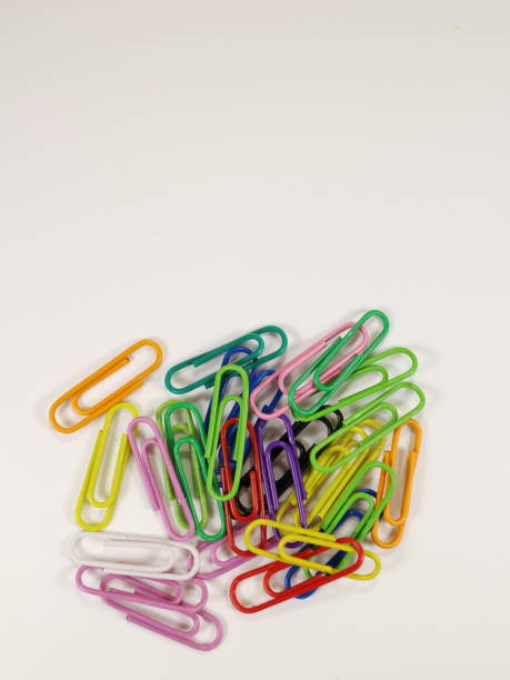 istock paper clips of different colors on a white background 910801974