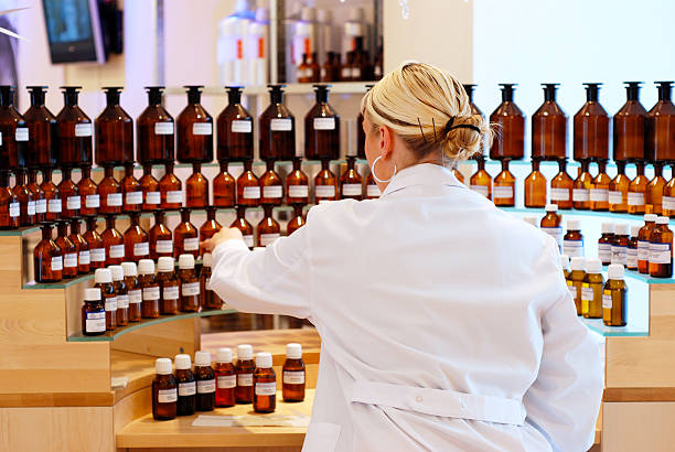 Chemist working in a Laboratory.  perfume counter stock pictures, royalty-free photos & images
