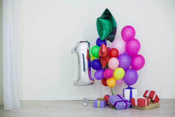 istock multi-colored balloons and gifts for the holiday 910806016