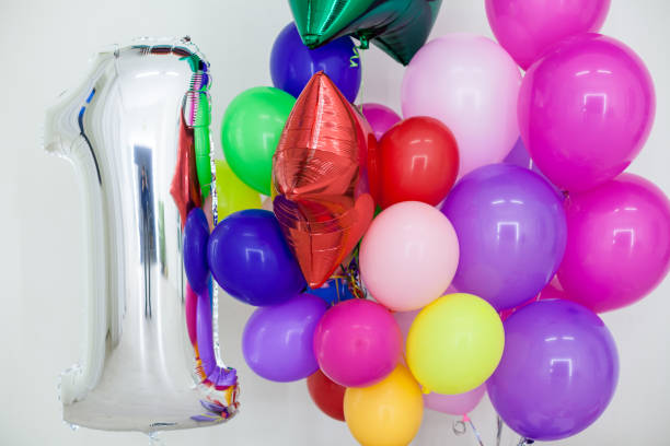 istock multi-colored balloons and gifts for the holiday 910806348