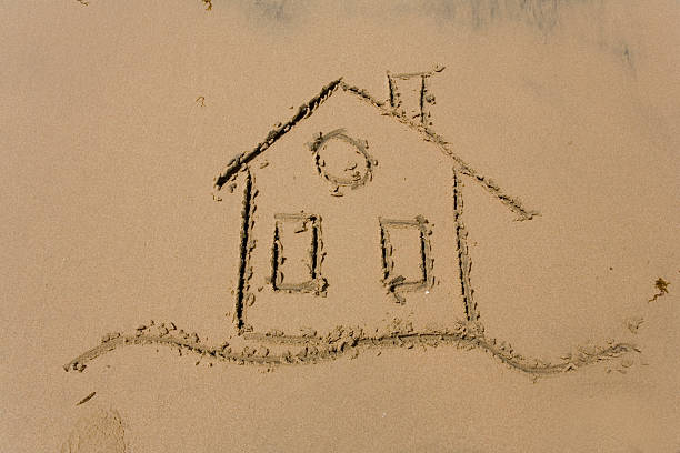 istock Drawing of the building on sea sand 91080861