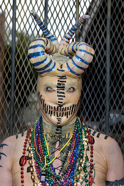 ツノラテックス男性 - mardi gras new orleans day of the week grass ストックフォトと画像