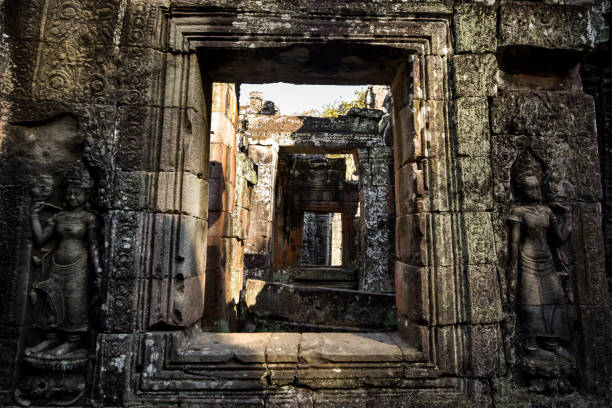 istock hindu figures at ta prohm temple in angkor archaeological park 910814780