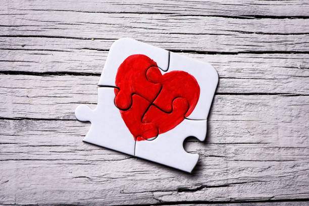 istock pieces of a puzzle forming a heart 910823964
