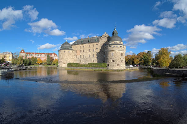 Hameenlinna, Finland - May 17, 2024: General view of the Hame Medieval Castle. It is a 700-year-old medieval royal castle in Hameenlinna, Finland. It is located in Hameenlinna, the city between Helsinki and Tampere.