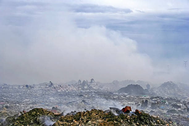 istock People who live in Garbage. Smoke. Pollution. 91082627