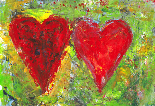 istock Two red hearts on grunge background acrylic painting 910828664