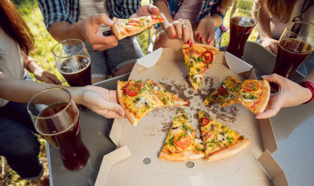 istock Cheerful friends on picnic 910828950