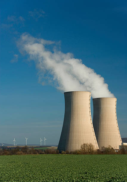 istock Steaming cooling towers and wind turbines (XL) 91082910