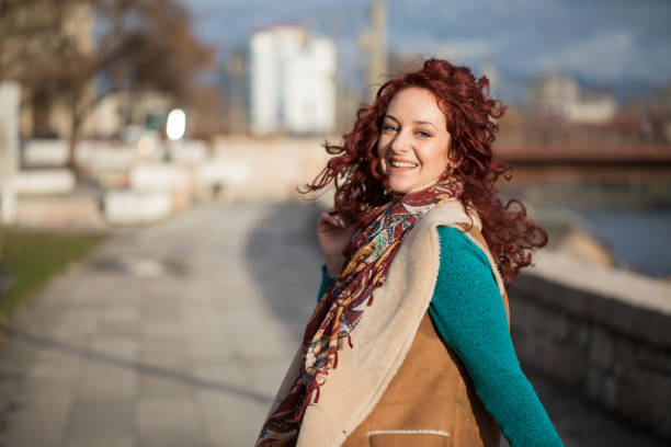 istock Redhead enjoys beautiful sunny day 910839942