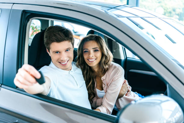 istock Boyfriend showing car key 910846796