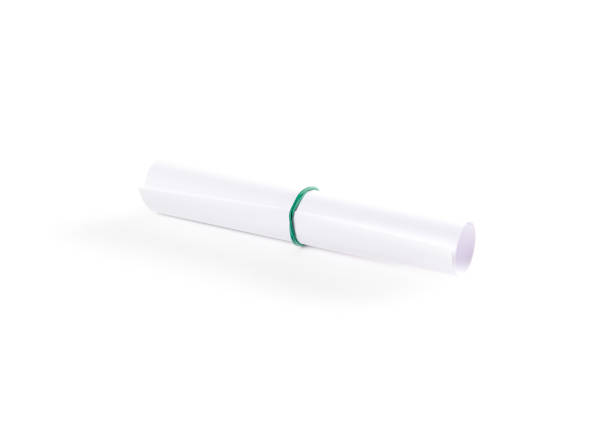 istock Scroll of white paper on a white background. Closeup 910851498