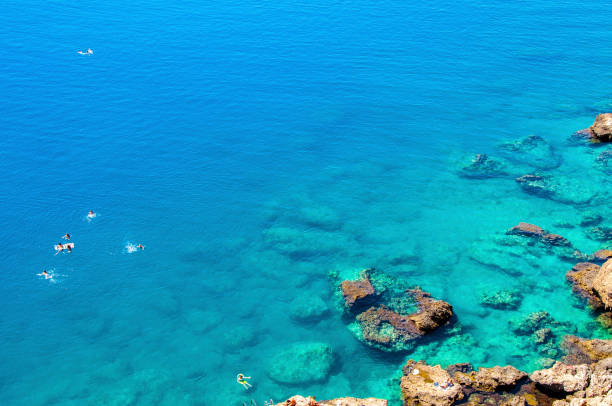 Side, Turkey - September 01, 2012 : People are swimming in Lara Beach of Antalya City.