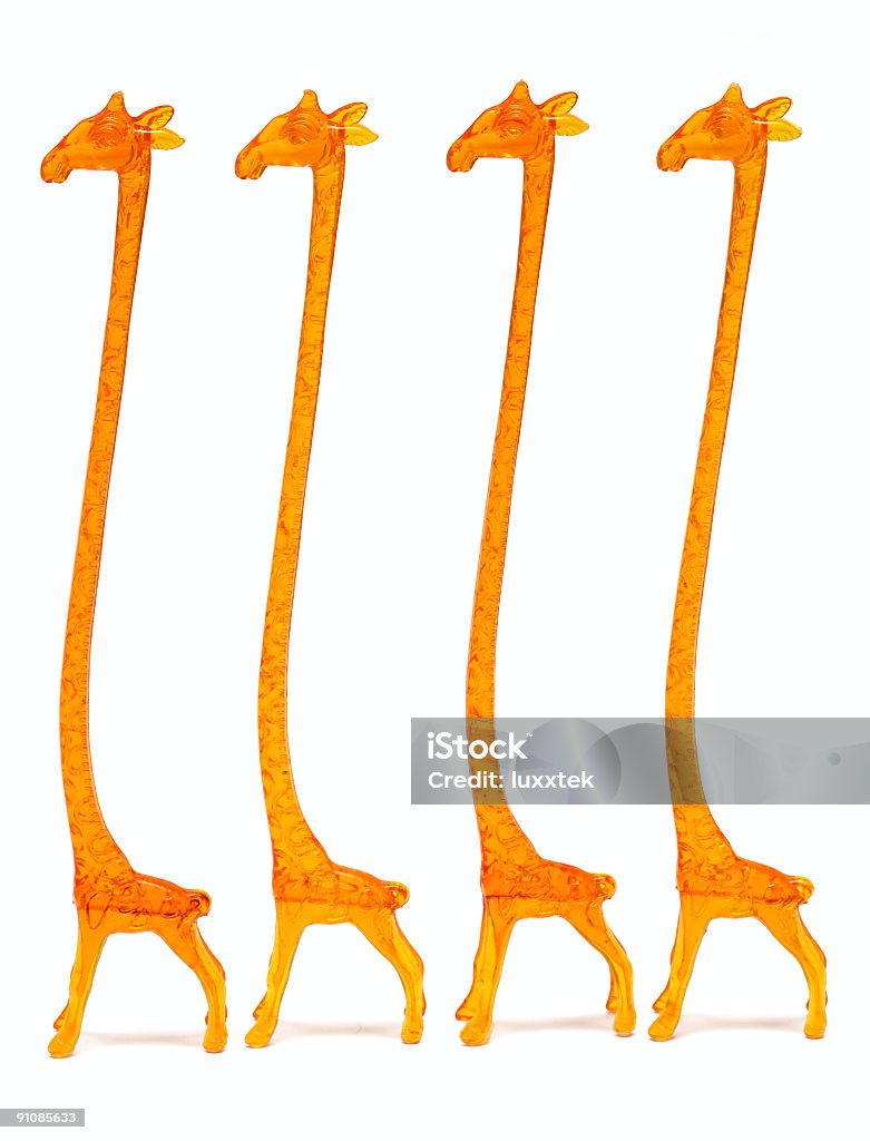 Giraffa forma di cocktail stirrers - Foto stock royalty-free di Agitatore da cocktail