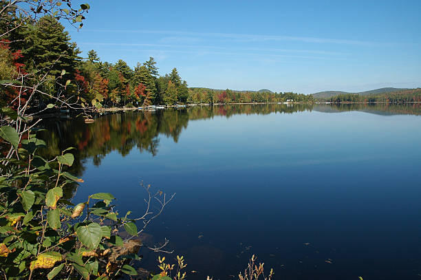 istock New Hampshire lake with reflection 91086996