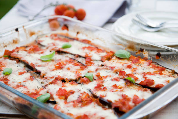 Eggplant lasagna - vegetarian recipe, no meat, only vegetables. Aubergine and tomato ratatouille, casserole. Hay diet recipe, only cheese and vegetables. large pasta pot stock pictures, royalty-free photos & images
