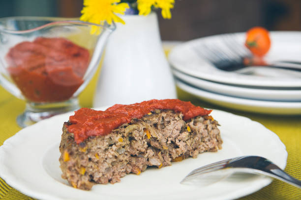 istock Homemade baked minced beef meatloaf with ground vegetables. 910874372