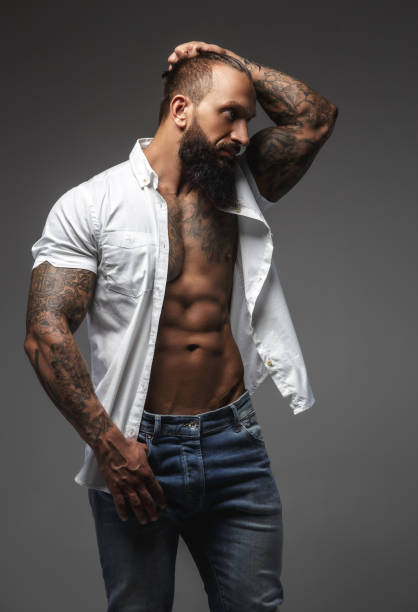 istock A man with tattooes on his arms 910879806