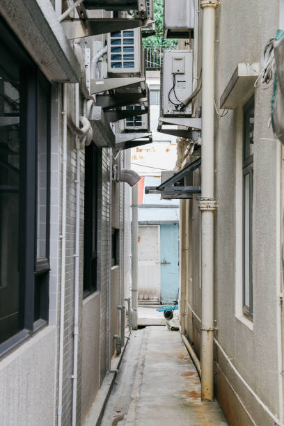 istock Narrow back street in HongKong 910893222